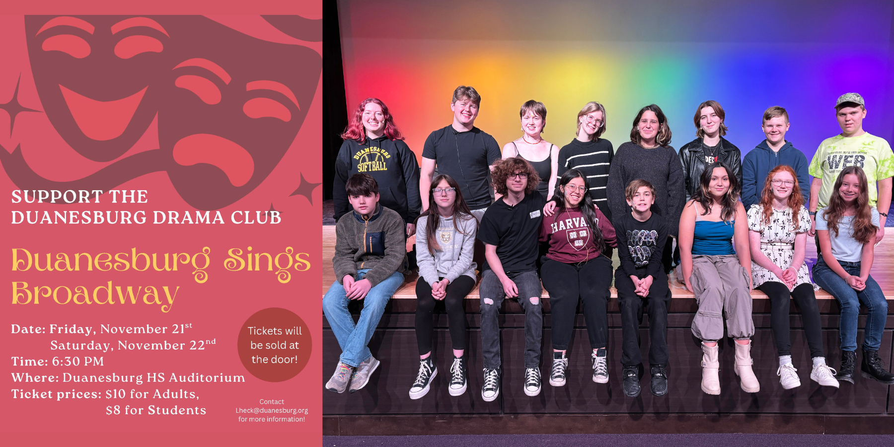 the cast of a theatrical show pose on a stage with rainbow colors behind them