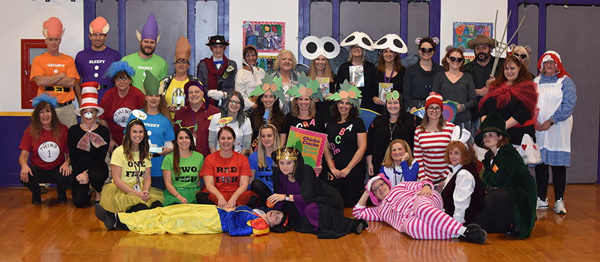 school faculty and staff drssed as literary figures on Halloween