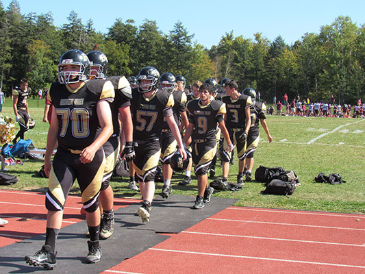 football players walking from field