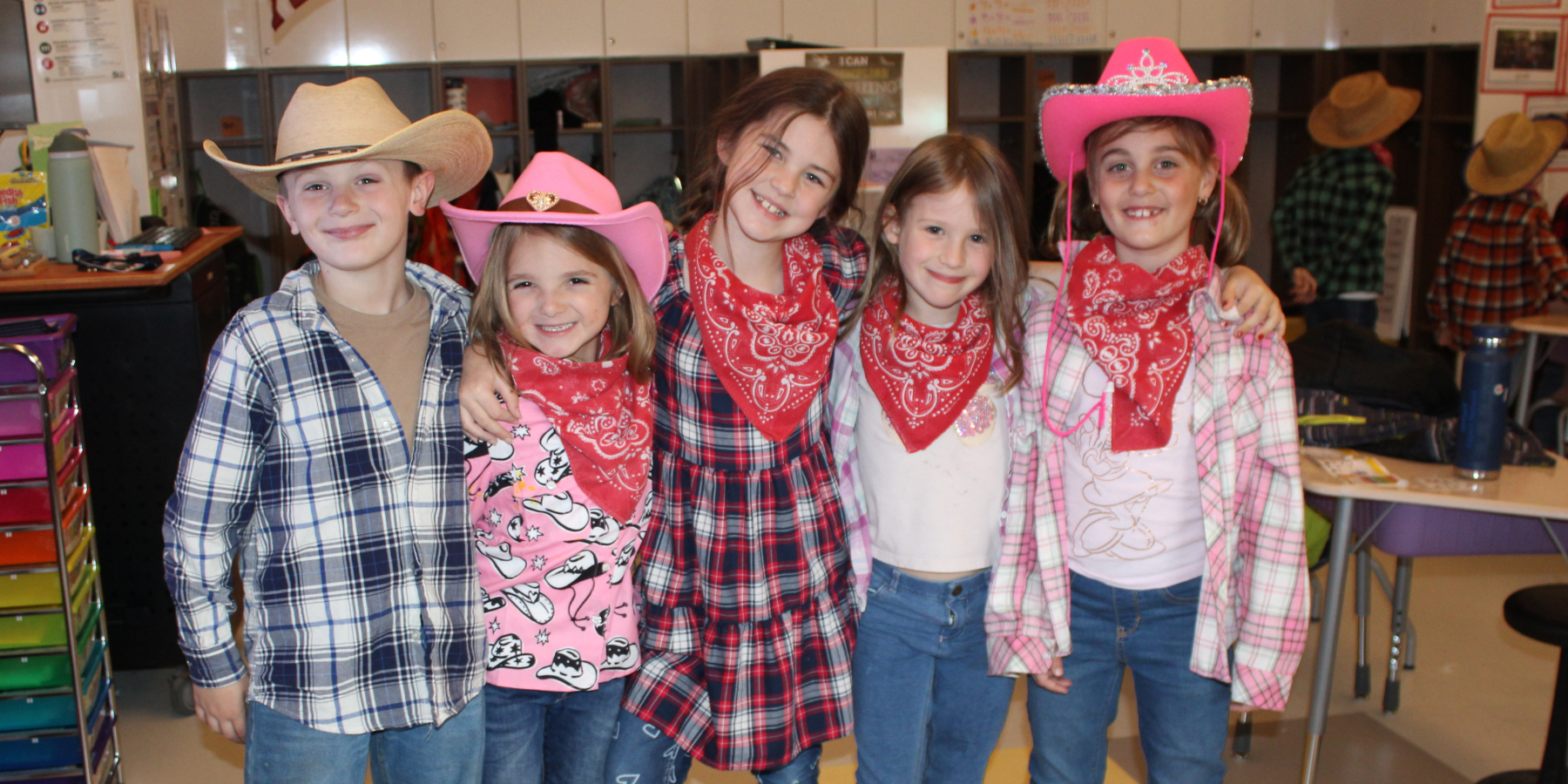 young children dressed as cowboys and cowgirls