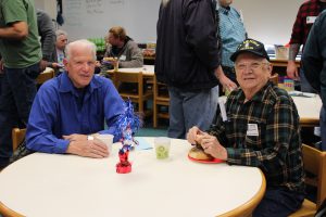 two veterans eat breakfast