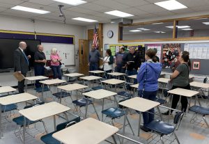 a group takes a tour of a classroom