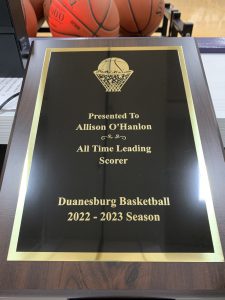 a plaque reads "presented to Allison O'Hanlon, All Time Leading Scorer, Duanesburg Basketball 2022-2023 Season."