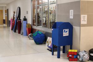 oversized sculptures are on display at a school