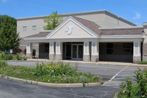 a building with a YMCA logo on the front