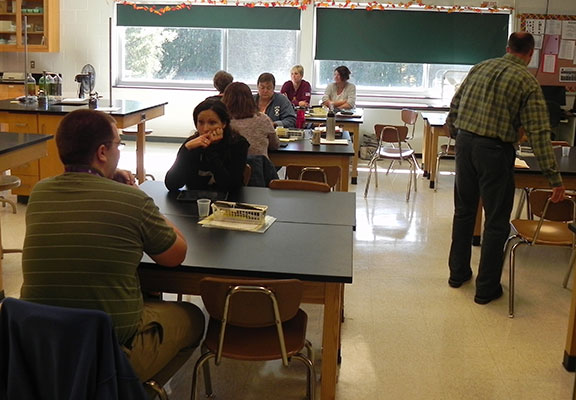 Teachers meeting in science room at Duanesburg High School