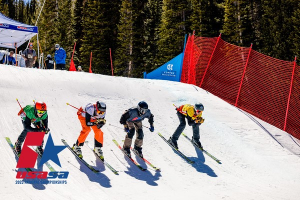 downhill skiers race each other