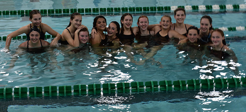 swimmers in the pool